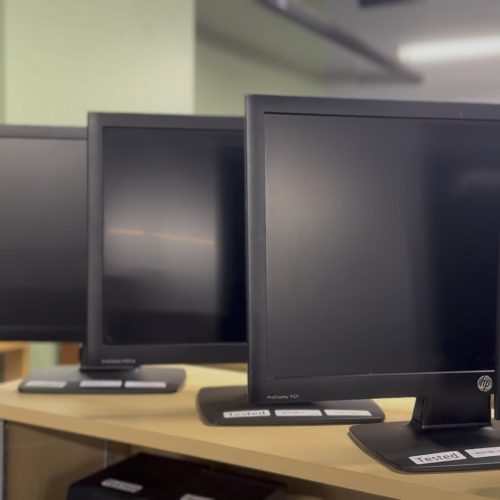 Rows of sleek, modern monitors on display at ReSOURCE Williston Vermont